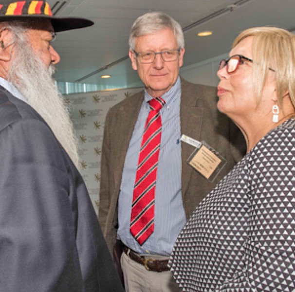 Three people talking