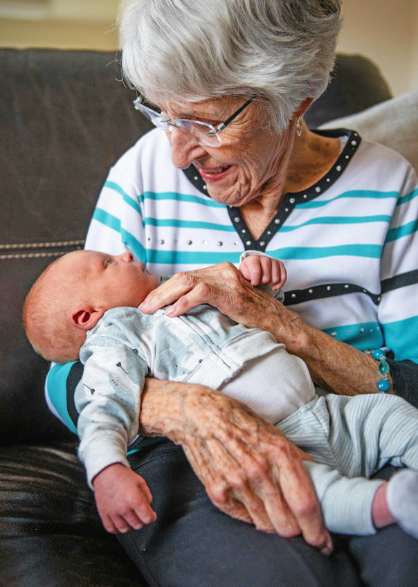 Senior grandmother with young baby