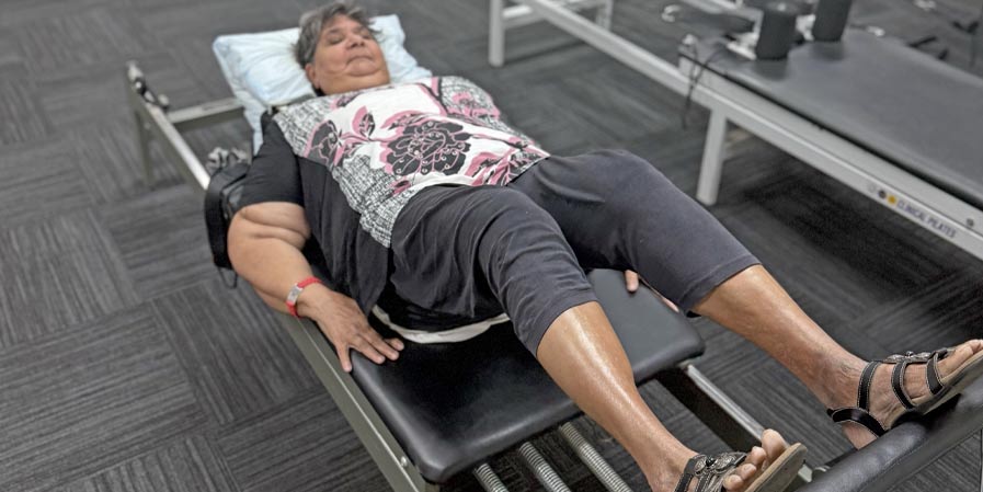 Gloria on the Pilates Reformer