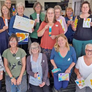 Horsham Wellbeing Day participants after a creative watercolour activity with local artist Michelle Watson, 3 April 2025.