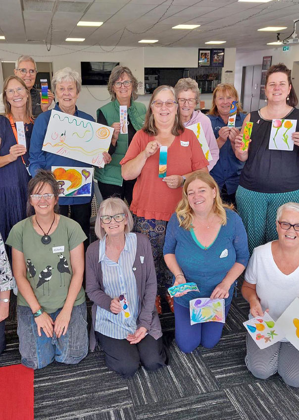 Horsham Wellbeing Day participants after a creative watercolour activity with local artist Michelle Watson, 3 April 2025.