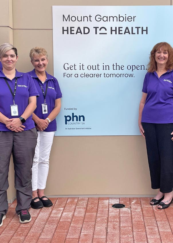 Staff next to the Mount Gambier Head to Health sign