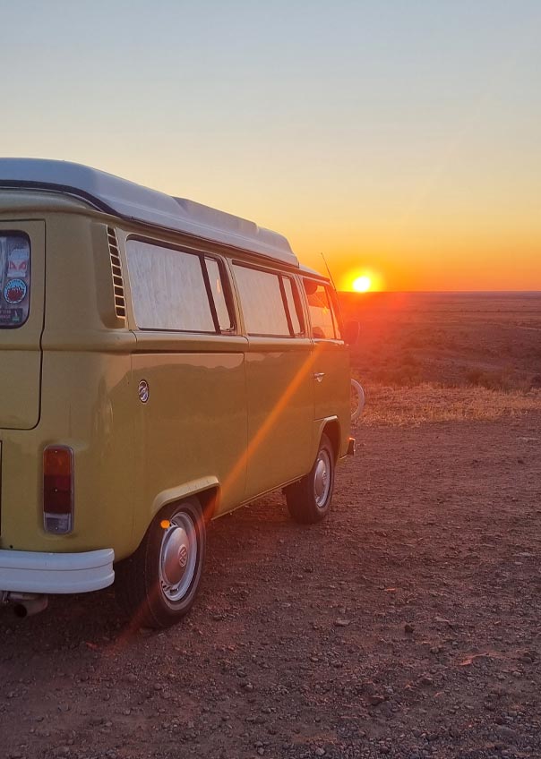 Kombi van at sunset
