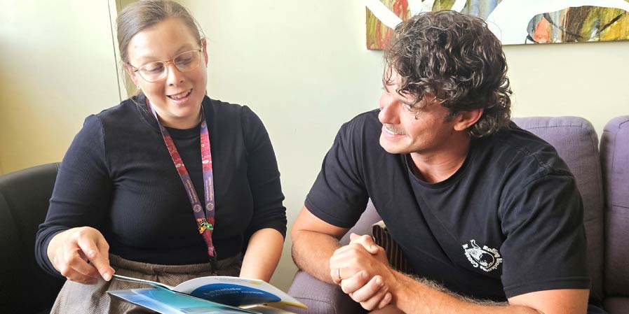 Ash counselling a patient