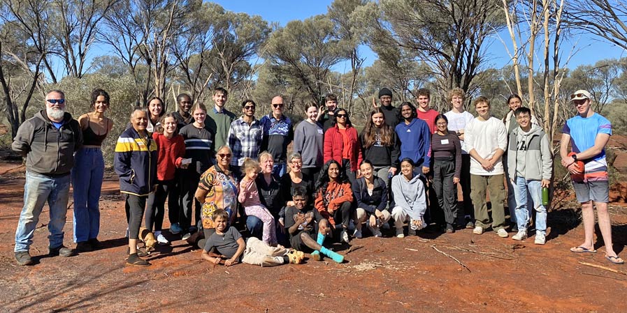 Group of people posing for photo