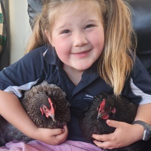 Billie with her beloved chickens