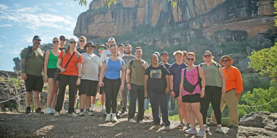 Students in West Arnhem and Kakadu National Park learning how Indigenous land management and ""Caring for Country"" serves as a proactive, low-cost alternative to reactive suppression models