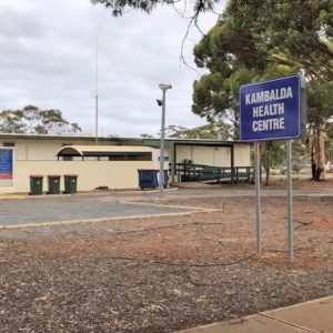 Kambala Health Centre facility with eucalyptus trees