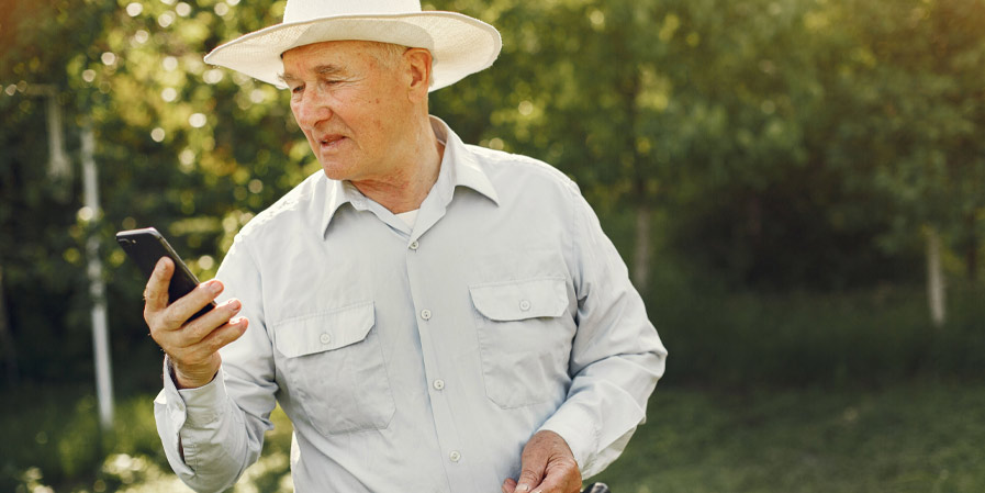Farmer using the phone service